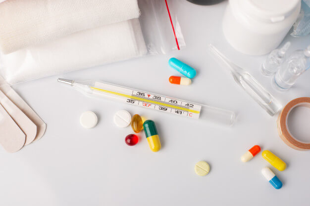 Medical thermomether pills other medical appliences first aid kit.