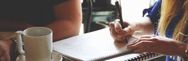 The girl doing homework.